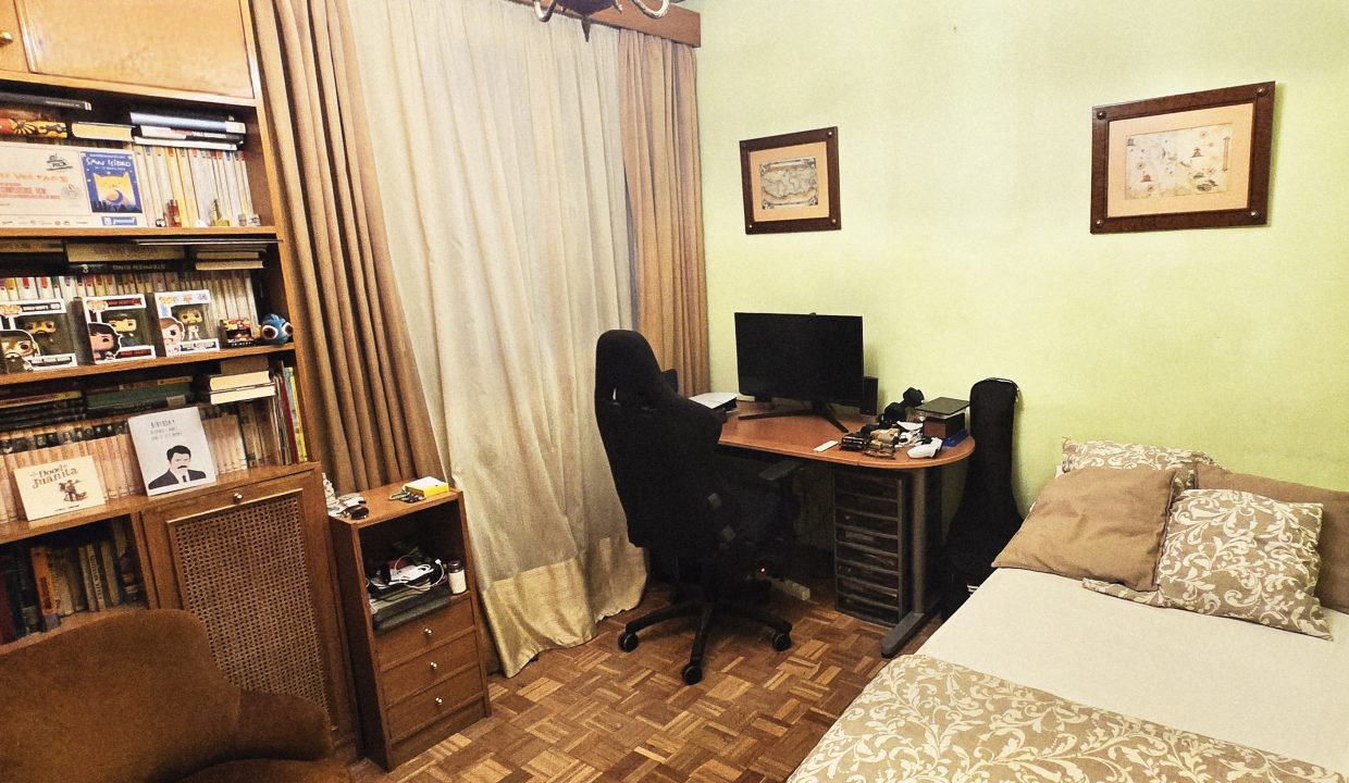 13. Dormitorio