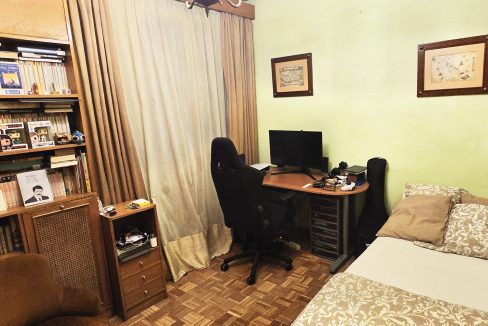 13. Dormitorio