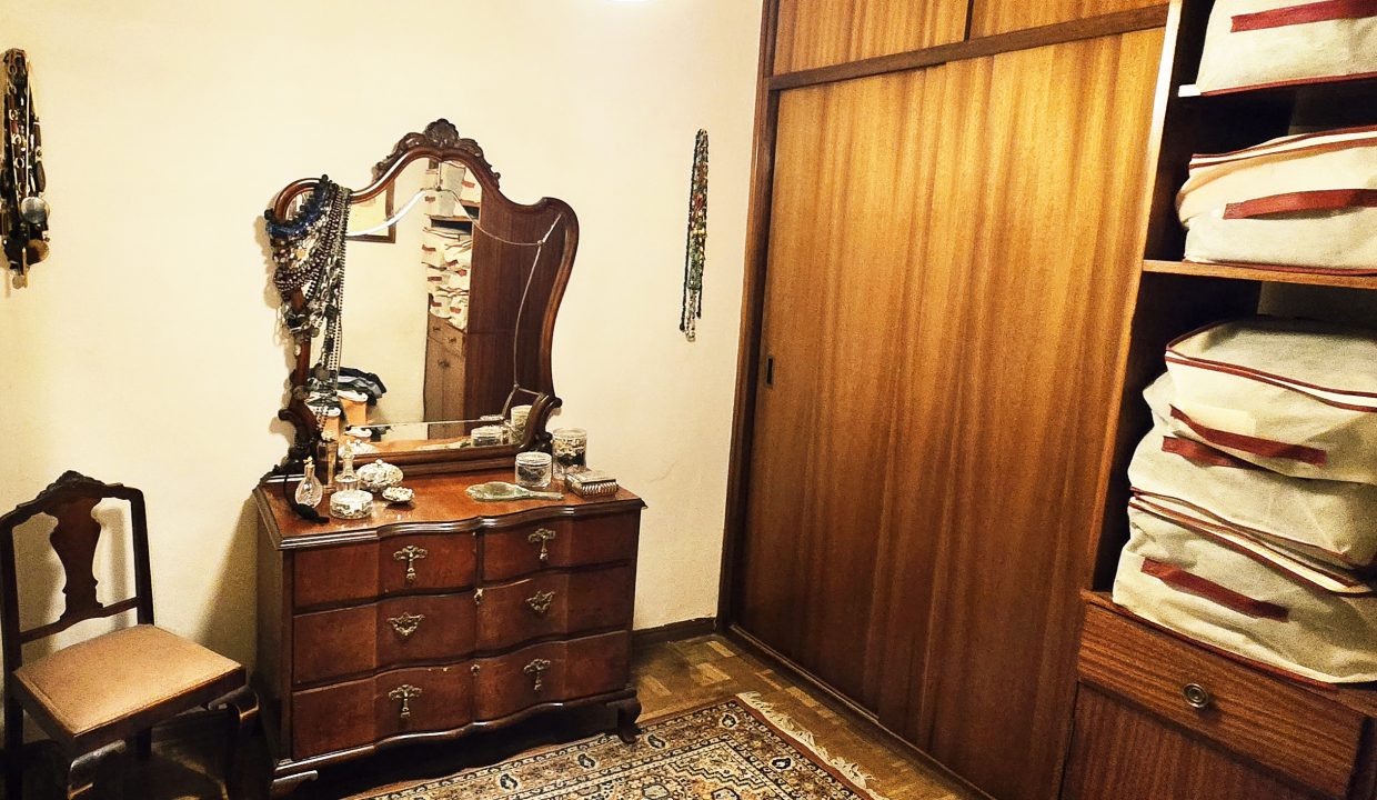18. Vestidor
